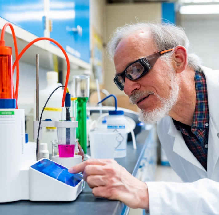 Scientist testing liquid